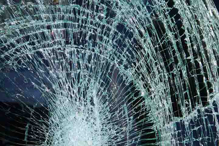 Broken car windshield made of laminated glass